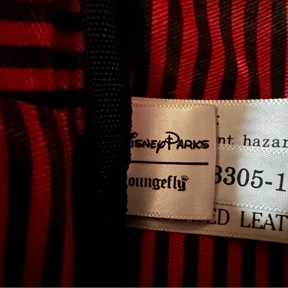 Disney Parks Loungefly Pirates of the Caribbean red and black mini backpack. - Picture 3 of 6